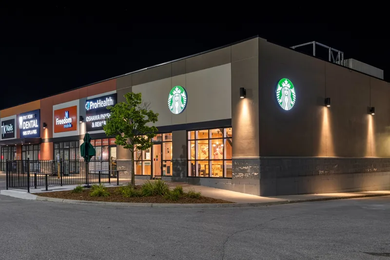 Starbucks storefront delivered as part of a national franchise rollout in Oshawa, Ontario